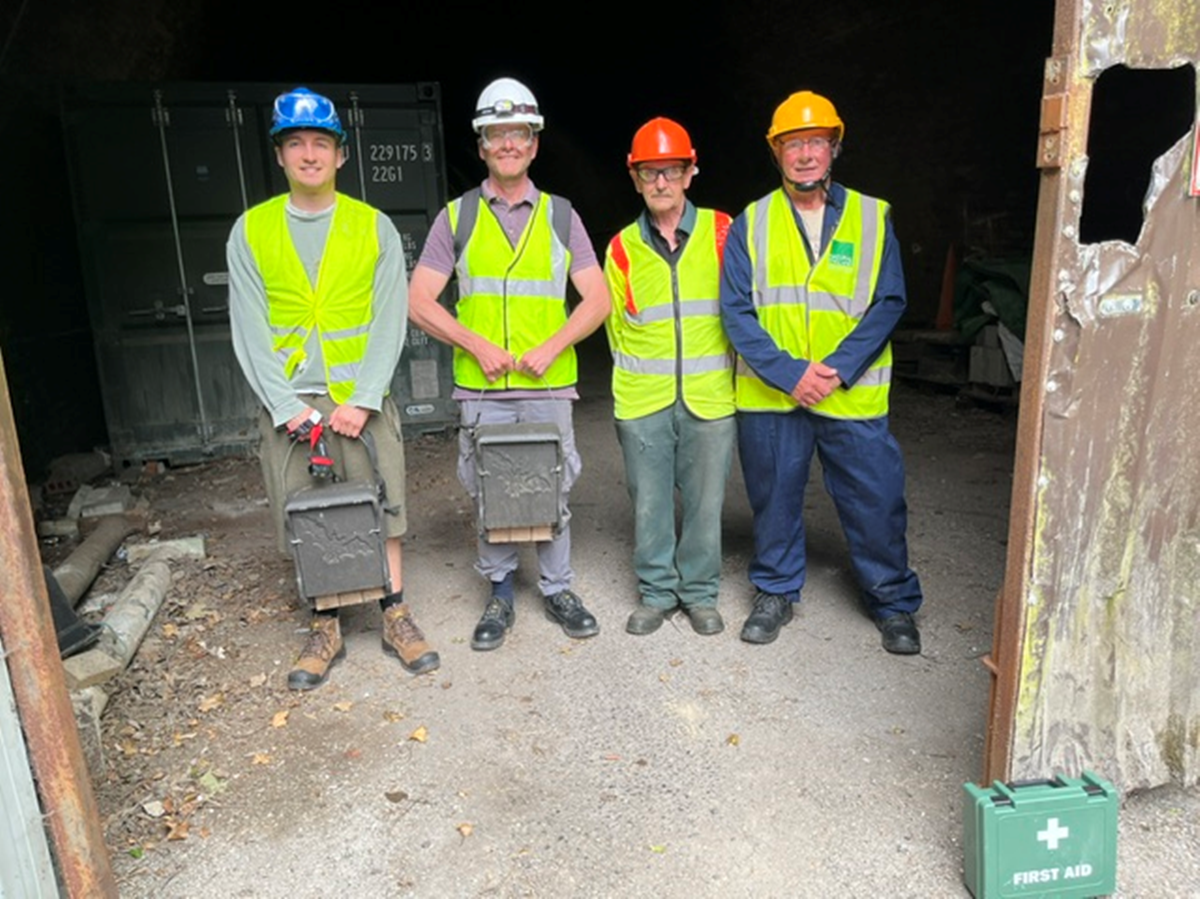 Friends of St Giles volunteers in entrance to Chesil Tunnel